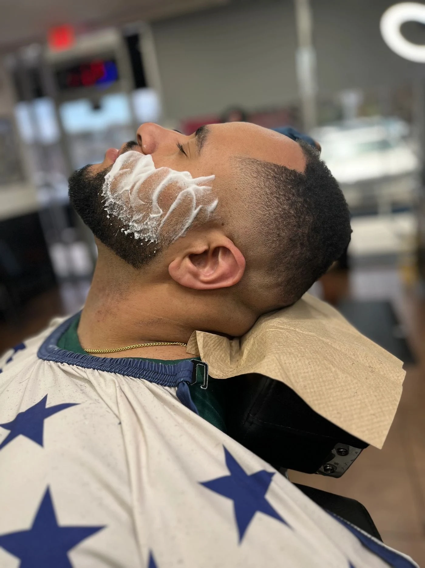 Hot towel shave in progress